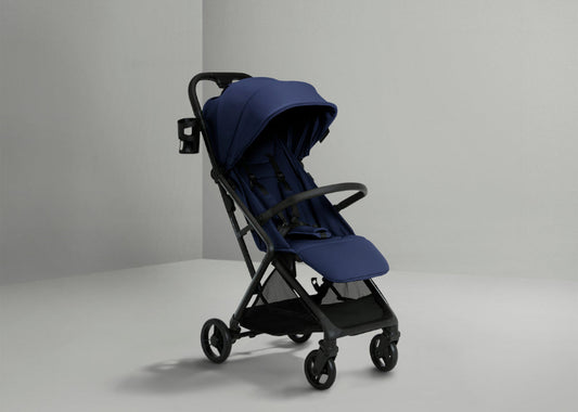 Blue stroller on a gray background
