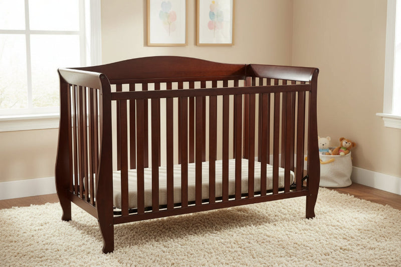 Wooden crib in a room with a teddy bear and toys on the floor.