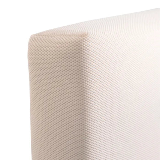 Close-up of a textured beige fabric surface