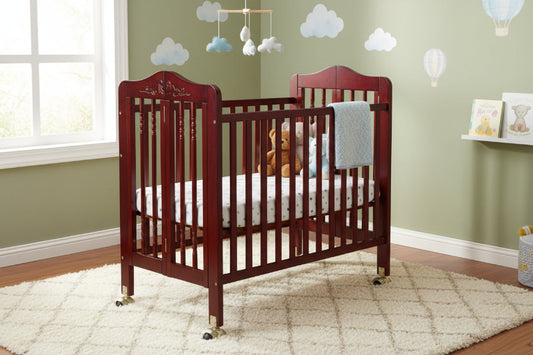 Wooden crib with wheels in a room setting