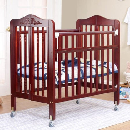 Wooden crib with wheels in a room setting