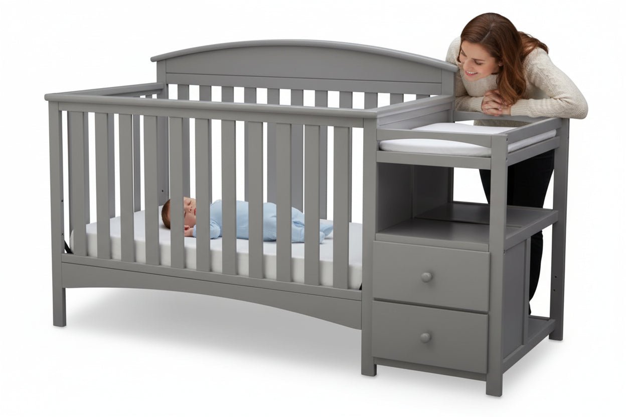 Gray crib with changing table on a white background