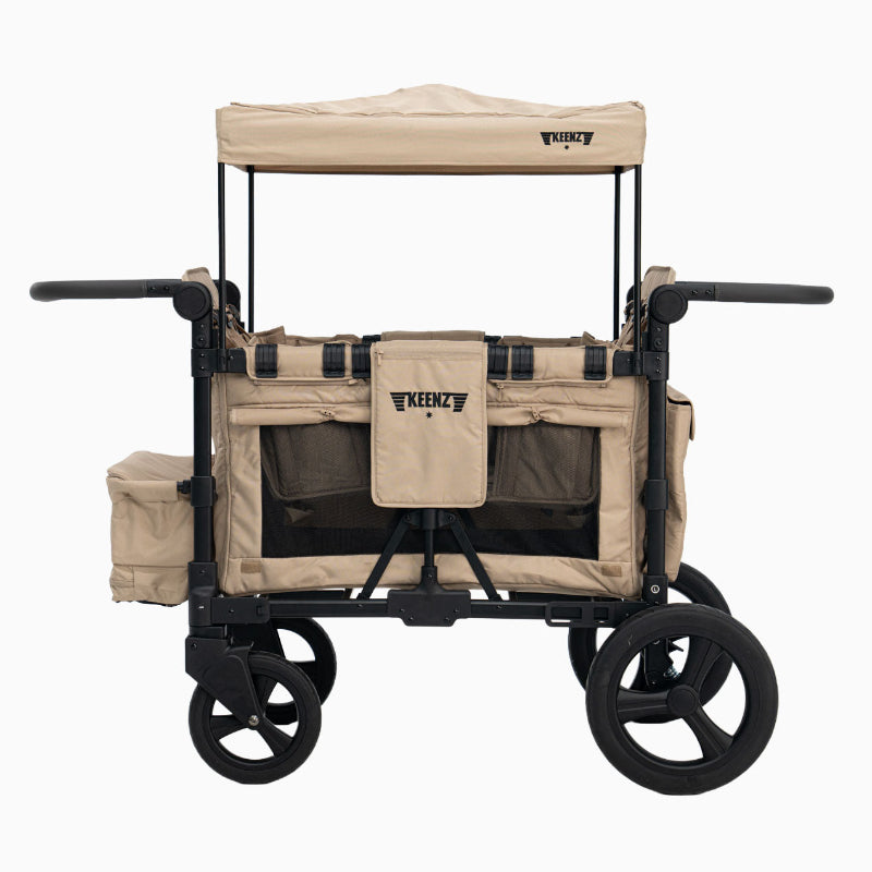 Beige and black stroller with canopy on a white background