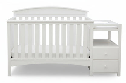 Gray crib with changing table on a white background