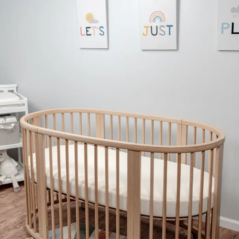 Eco-friendly oval baby mattress with safe infant firmness and washable cover