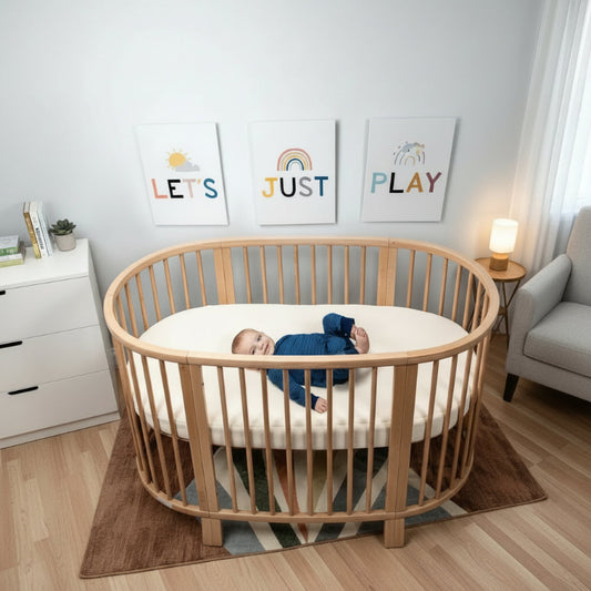 Breathable organic oval crib mattress designed to fit Stokke Sleepi crib for safer baby sleep