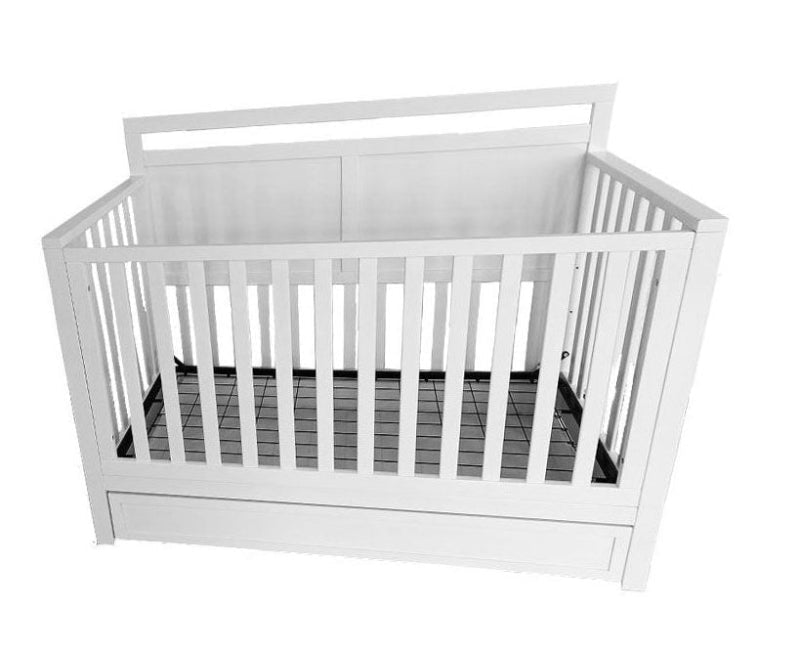 White crib with wooden slats on a white background