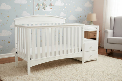 Gray crib with changing table on a white background